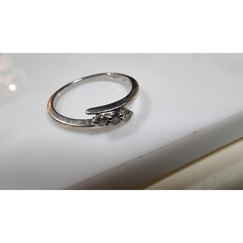 419 - Hallmarked 9ct white gold three stone genuine diamond ring in good clean condition size L total weig... 