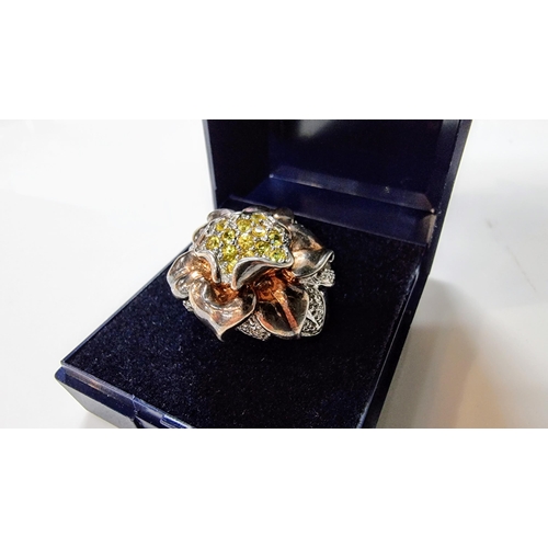 248 - Chunky ornate 925 silver ring with an unusual flower design, inset with large qty of genuine yellow ... 