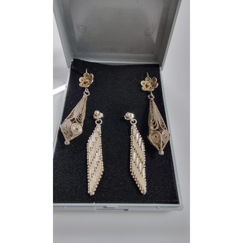 244 - Two pairs of 925 Silver drop earrings, inc. a filigree pair. Both in good condition. Both marked 925... 