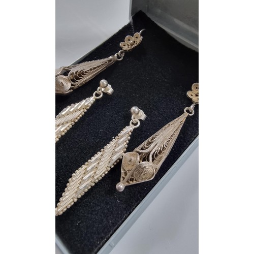 244 - Two pairs of 925 Silver drop earrings, inc. a filigree pair. Both in good condition. Both marked 925... 