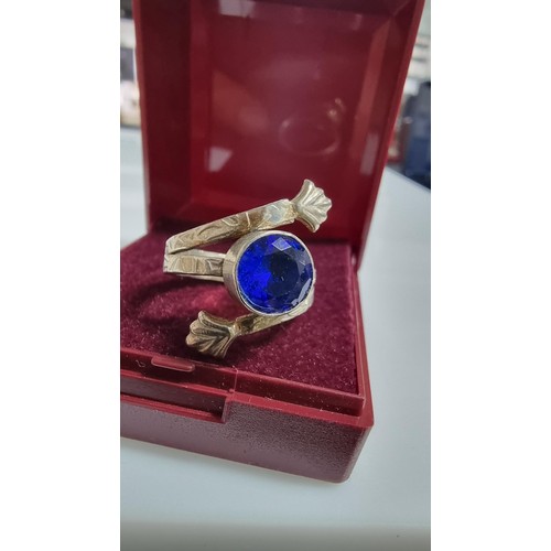 245 - Pretty 925 silver dress ring with a large blue glass crystal to the centre. In good clean condition.... 