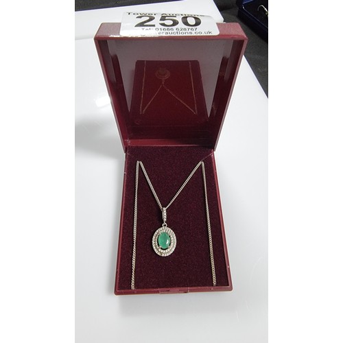 250 - Pretty 925 Silver dress necklace inset with a green glass crystal surround by CZ stones. Complete wi... 