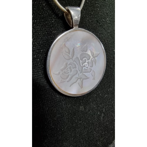 252 - 925 silver double sided pendant inset with MOP on a very long 22