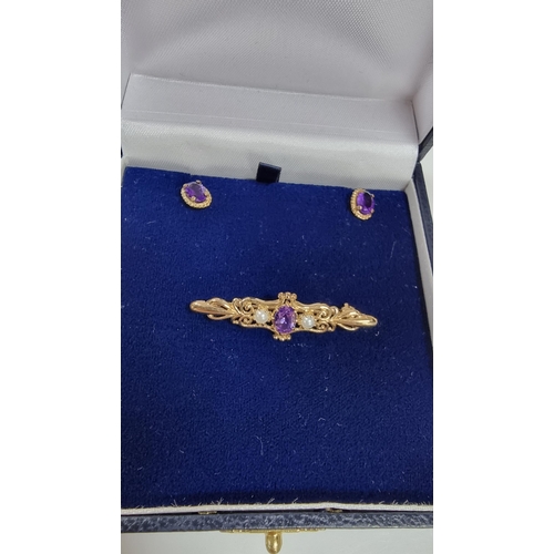 308 - Pretty 9ct gold matching jewellery set including a brooch with split seed pearls an oval amethyst to... 