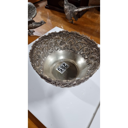 370 - Solid Sterling silver embossed footed bowl with ornate design, super order marked Silver to base and... 