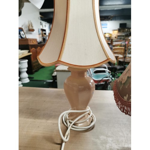 406 - 3x table lamps inc matching pair of peach coloured St. Michael lamps along with a art ceramic lamp. ... 