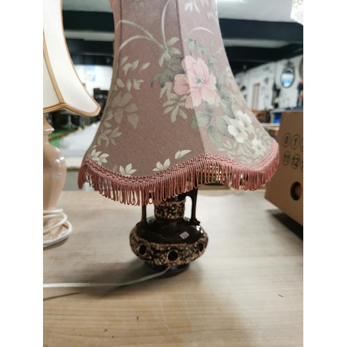 406 - 3x table lamps inc matching pair of peach coloured St. Michael lamps along with a art ceramic lamp. ... 