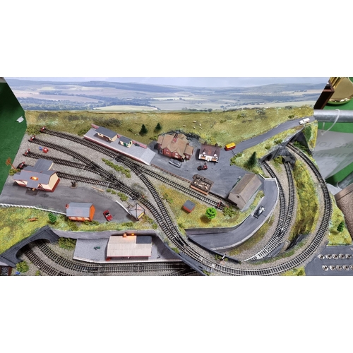 491 - Very well done N gauge train layout diorama, fitted in a good quality metal case presenting excellen... 