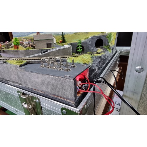 491 - Very well done N gauge train layout diorama, fitted in a good quality metal case presenting excellen... 