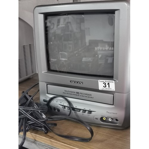 31 - Retro colour tv combi unit with vhs player comes with car adapter and aerial. in good order