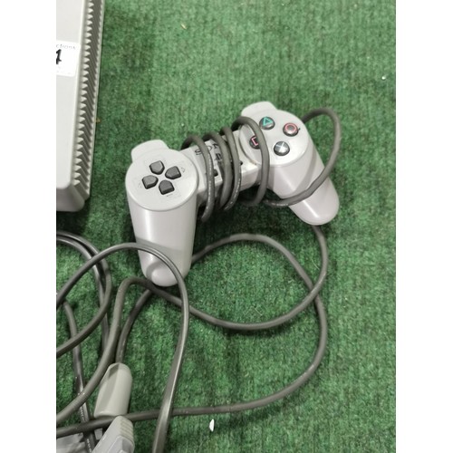 44 - Sony Playstation inc 2 Controllers and Power Cable, and memory card