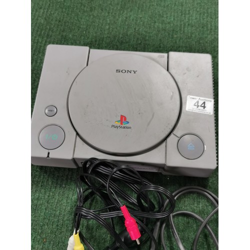 44 - Sony Playstation inc 2 Controllers and Power Cable, and memory card