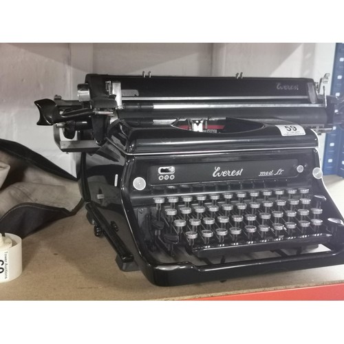 59 - Vintage Italian Everest mod.s.t typewriter, complete with cover. In Excellent overall condition.