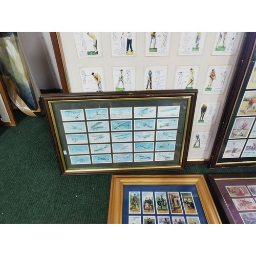 69 - Quantity of 5 framed and glazed cigarette cards, inc golfers, bicycles and historic events. Largest ... 