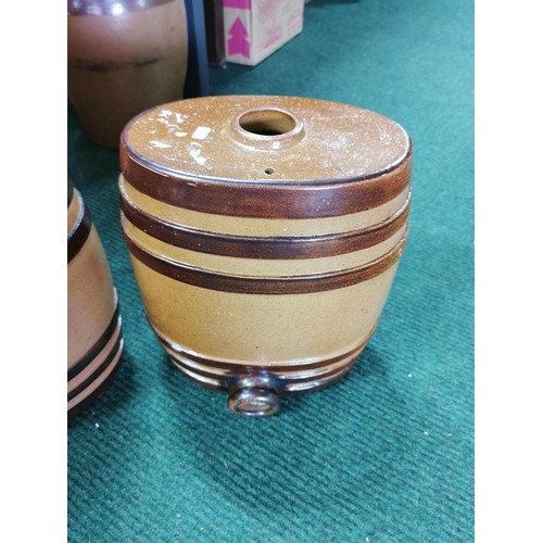 80 - Pair of earthenware ribbed casks in good order height of 28cm