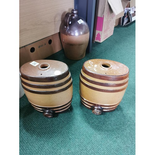 80 - Pair of earthenware ribbed casks in good order height of 28cm