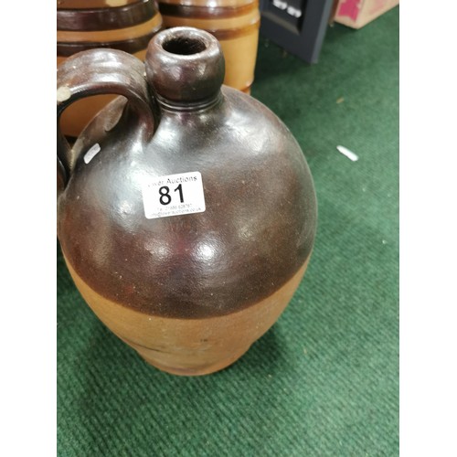 81 - Drip glaze earthen ware flagon in good order, 40cm high.