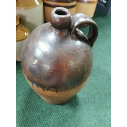 81 - Drip glaze earthen ware flagon in good order, 40cm high.