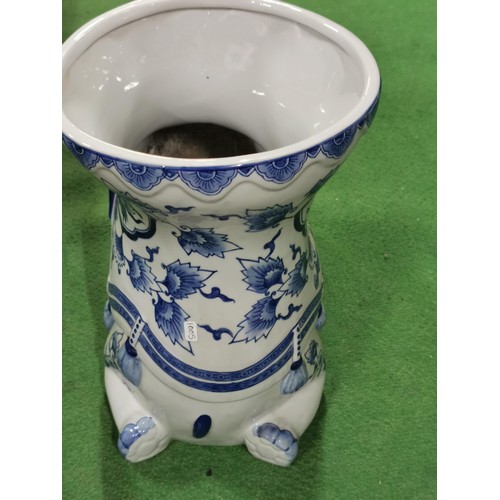 109 - Large ceramic elephant formed planter in a blue and white design. Planter stadns at 31cm high, 38cm ... 