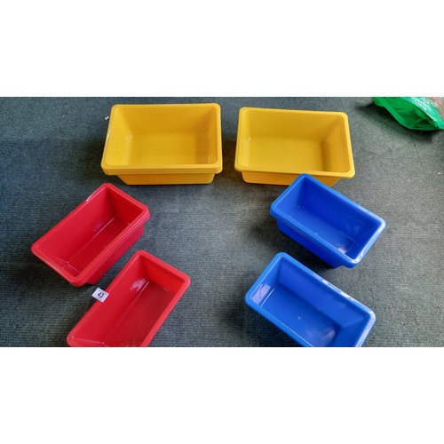 43 - Quantity of 12 Plastic Containers, 4 blue, 4 red, 4 yellow. Largest measures H 13cm, 39 L, 29, W