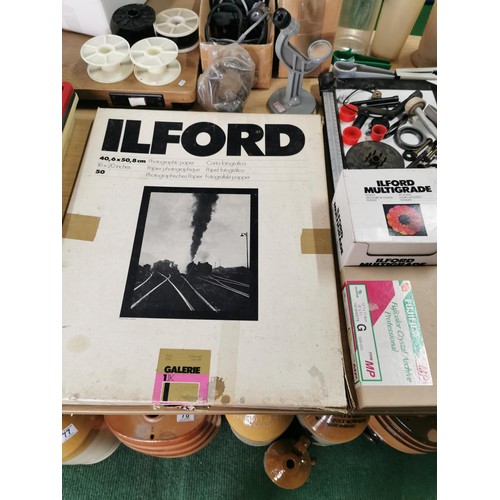 112 - Large quantity of dark room equipment inc 6 boxes of Ilford photographic paper and Agfa, 2x Paterson... 