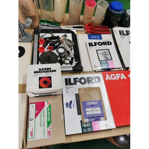 112 - Large quantity of dark room equipment inc 6 boxes of Ilford photographic paper and Agfa, 2x Paterson... 