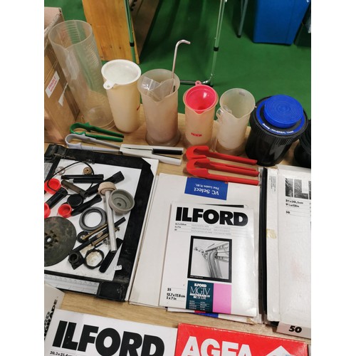 112 - Large quantity of dark room equipment inc 6 boxes of Ilford photographic paper and Agfa, 2x Paterson... 