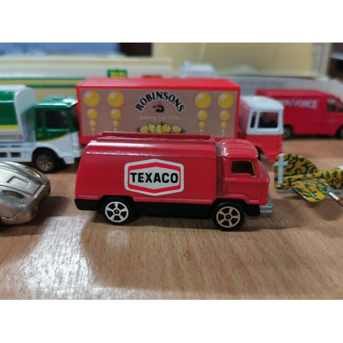 133 - Collection of Diecast toys inc a boxed Hershey's Coco truck, boxed Wlaker's Crisps truck, BP truck, ... 