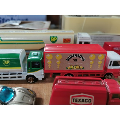 133 - Collection of Diecast toys inc a boxed Hershey's Coco truck, boxed Wlaker's Crisps truck, BP truck, ... 