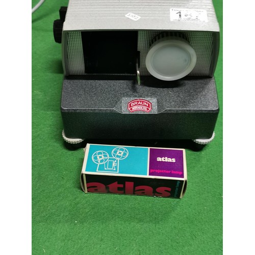 167 - Braun Paximat-S electric slide projector, comes with a boxed Atlas bulb takes inline cartridges - un... 