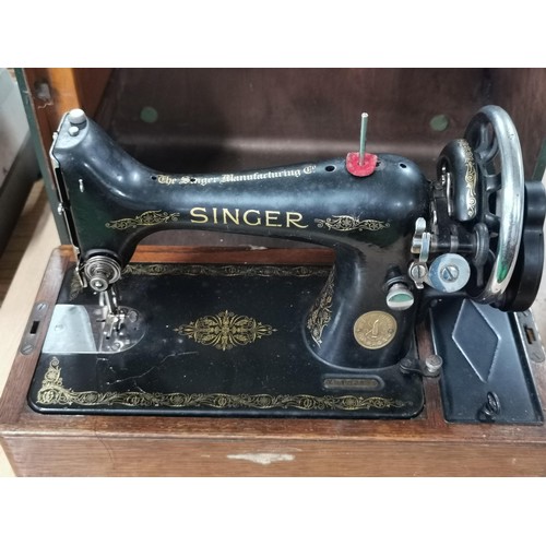 168 - Singer sewing machine in a fitted case with drawer and accessories. Model 99k - Year 1933. Model No.... 