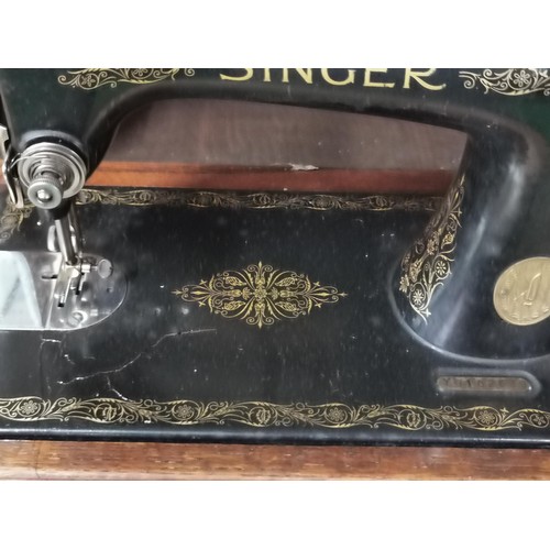 168 - Singer sewing machine in a fitted case with drawer and accessories. Model 99k - Year 1933. Model No.... 