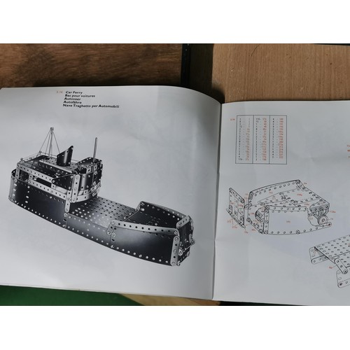 170 - Quantity of vintage Meccano along with an original Meccano tin of screws, partially built Meccano ca... 
