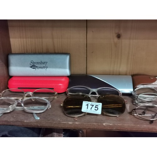 175 - Quantity of 10x reading glasses, collection of reading glass cases, mobile phones and ceramic eye ba... 