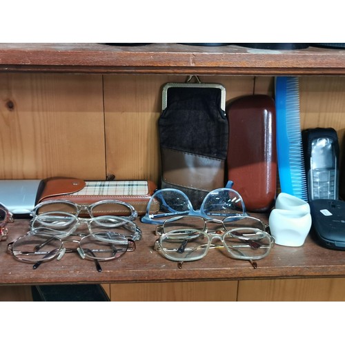 175 - Quantity of 10x reading glasses, collection of reading glass cases, mobile phones and ceramic eye ba... 