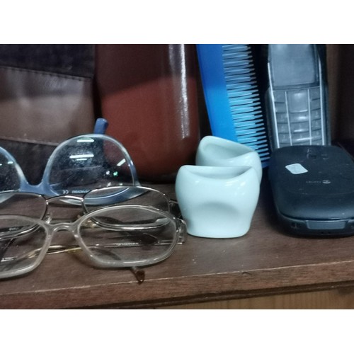 175 - Quantity of 10x reading glasses, collection of reading glass cases, mobile phones and ceramic eye ba... 