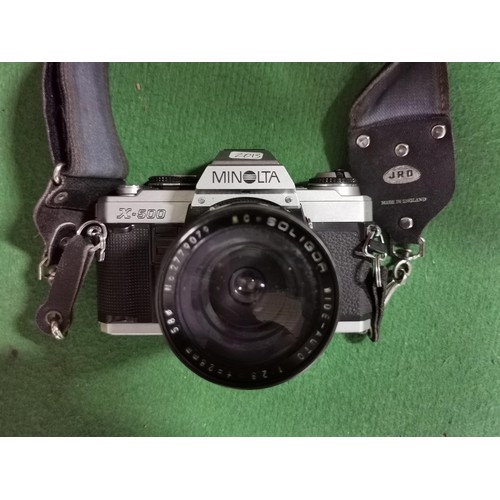 176 - Minolta X500 SLR camera with a 14mm lens along with a Soligor lens, all in good order