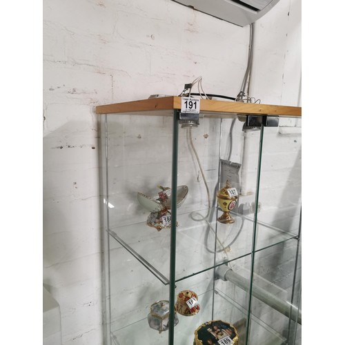 191 - Tall illuminated display cabinet, 3 shelves, 2 glazed with 2 magnetic closing glazed doors with 3 li... 