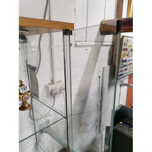 191 - Tall illuminated display cabinet, 3 shelves, 2 glazed with 2 magnetic closing glazed doors with 3 li... 