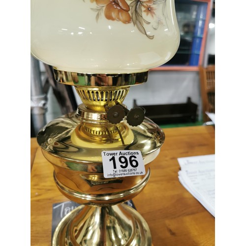 196 - Vintage double bowled claw footed oil lamp with no chimney along with a modern reproduction oil lamp... 