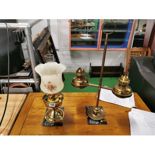 196 - Vintage double bowled claw footed oil lamp with no chimney along with a modern reproduction oil lamp... 