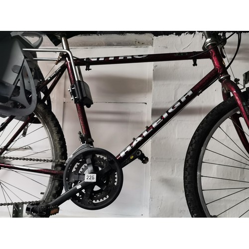 228 - 20 inch Raleigh 15 speed Shimano index system mountain bike complete with Hamax child's seat easily ... 