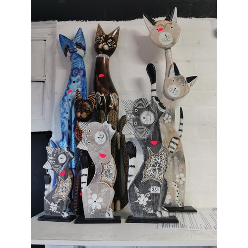 231 - Collection of 7x Fair Trade wooden cats, tallest measuring 92cm, all in good order