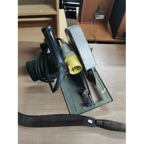 416 - AEG 110w circular saw along with a bill hook. bill hook measures 56cm