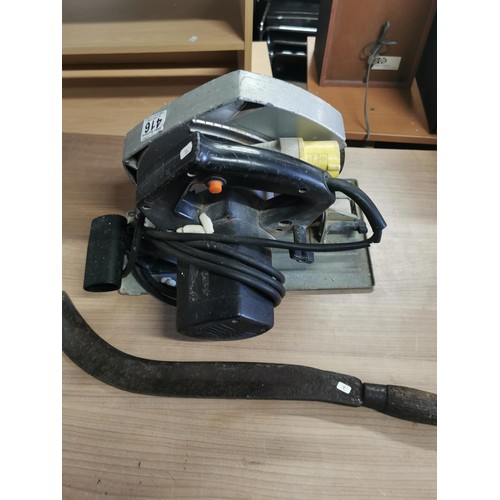 416 - AEG 110w circular saw along with a bill hook. bill hook measures 56cm