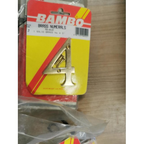 430 - Large quantity of new and sealed brass numbers by Bambo and Jaypac inc numbers 0,2,3,4,5,7, 9. Well ... 