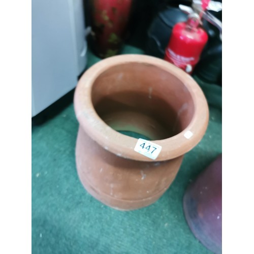 447 - 2x chimney cowl plant pots. One stands 32cm high x diameter of 29cm. The other stands at 32cm high w... 