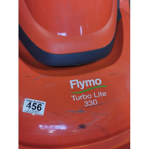 456 - Electric Flymo Turbo Light 330 along with an original Flymo key