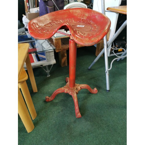 510 - Vintage Walter A Wood cast iron tractor seat made into a adjustable stool, part of edge of seat is A... 