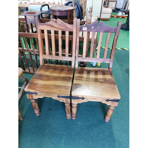 518 - Pair of Shesham chairs with metal bounding in very good condition, made of solid shesham. 98cm high